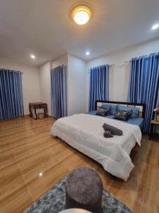 Voodi või voodid majutusasutuse The Hub Kampot toas