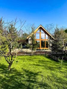 Κήπος έξω από το Cozy Chalet A-Frame