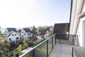 A balcony or terrace at STAYY Flagship Limmattal - contactless check-in