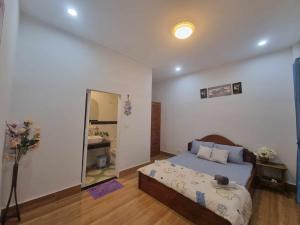 Voodi või voodid majutusasutuse The Hub Kampot toas