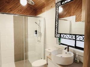 a bathroom with a sink and a shower at D103 Lemon Tree House in Melbourne +8 photos