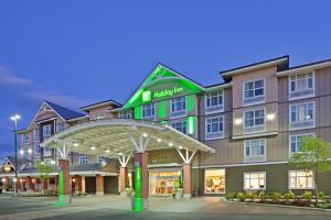 a rendering of a hotel with a building at Holiday Inn Hotel & Suites Surrey East - Cloverdale, an IHG Hotel in Surrey