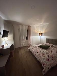 Ένα ή περισσότερα κρεβάτια σε δωμάτιο στο B&b Blog