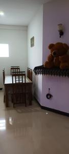 a room with a bed with teddy bears on it at ONELI VILLA MIRISSA in Mirissa