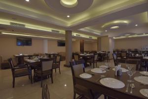 Ресторант или друго място за хранене в Gourav Lodge