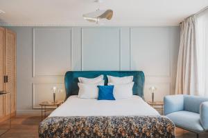 Postel nebo postele na pokoji v ubytování Hôtel Singulier Bordeaux - Boutique Hôtel & Spa Anne Semonin
