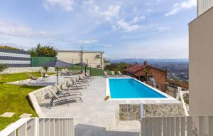 a swimming pool on top of a house at Apartman 2A in Breza
