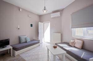 Χώρος καθιστικού στο Yasmine Apartments and Rooms