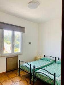 Postel nebo postele na pokoji v ubytování Villa Eagle