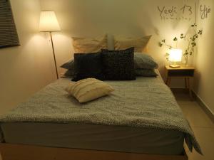 Postel nebo postele na pokoji v ubytování Yeojie 13 Homestay Rawang