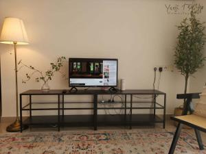 TV a/nebo společenská místnost v ubytování Yeojie 13 Homestay Rawang