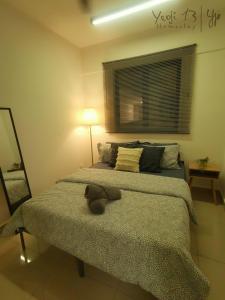 Postel nebo postele na pokoji v ubytování Yeojie 13 Homestay Rawang + 5 fotografií
