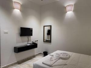 Postel nebo postele na pokoji v ubytování Le Tamara Suite - TIE Hotels & Resorts