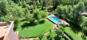 an aerial view of a yard with a swimming pool at Country homes in Ourika