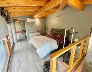 Voodi või voodid majutusasutuse Ferienhaus mit Privatpool für 6 Personen ca 250 qm in Trecastagni, Sizilien Ostküste von Sizilien toas