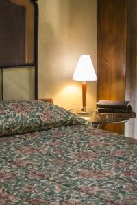 Voodi või voodid majutusasutuse Al Borducan Boutique Hotel toas