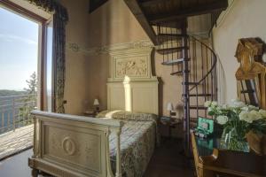 Voodi või voodid majutusasutuse Al Borducan Boutique Hotel toas