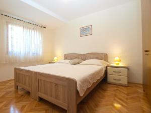 A bed or beds in a room at Ferienwohnung für 4 Personen ca 40 qm in Pula, Istrien Istrische Riviera - b54407