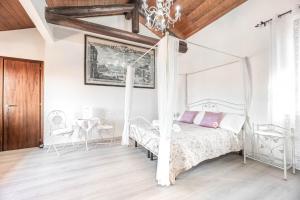 Postel nebo postele na pokoji v ubytování Residenza Bra Verona