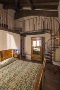 Voodi või voodid majutusasutuse Al Borducan Romantic Hotel - Adults Only toas
