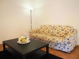 a living room with a couch and a table at Ferienwohnung für 4 Personen ca 90 qm in Botricello, Kalabrien Provinz Catanzaro in Botricello