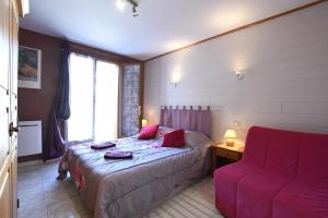Un pat sau paturi într-o cameră la Gite Le Courlis