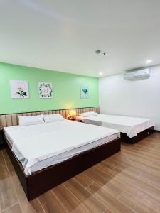 Un ou plusieurs lits dans un hébergement de l'établissement Villa 7 ngủ gần biển, gần bãi tắm - Trung tâm Bãi Cháy