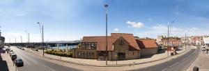 a building on the side of a road at Harbourside Apartments with Private Parking in Scarborough
