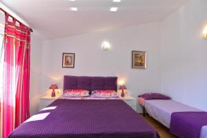 En eller flere senge i et værelse på Ferienwohnung für 5 Personen ca 41 qm in Pula, Istrien Istrische Riviera