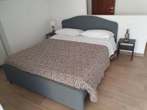 Postel nebo postele na pokoji v ubytování GIANGY HOME