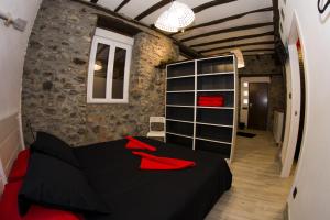 Cama o camas de una habitación en Andra Mari Apartamentu Turistikoak