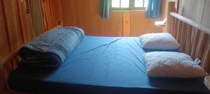 Posteľ alebo postele v izbe v ubytovaní Cabanes des Landes- cabane sur pilotis