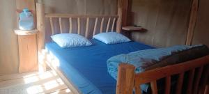 Posteľ alebo postele v izbe v ubytovaní Cabanes des Landes- cabane sur pilotis