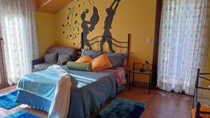 En eller flere senger på et rom på O Carballo de Liripio