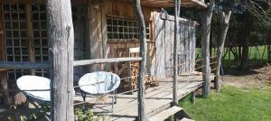 Vonkajšia záhrada v ubytovaní Cabanes des Landes- cabane sur pilotis