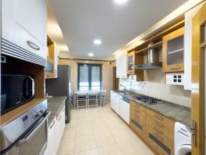 A kitchen or kitchenette at Luxury Apartments in Expo