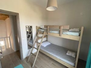 Postel nebo postele na pokoji v ubytování Loris’House