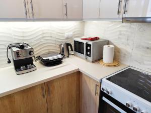 A kitchen or kitchenette at Marlen House Chania