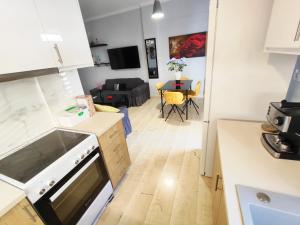 A kitchen or kitchenette at Marlen House Chania