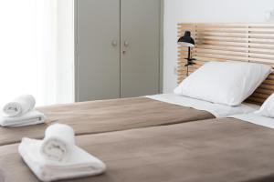 Postel nebo postele na pokoji v ubytování Platon Central Apartment