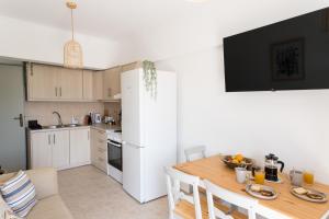 Kuchyň nebo kuchyňský kout v ubytování Platon Central Apartment
