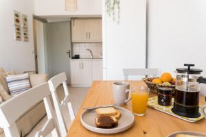 Kuchyň nebo kuchyňský kout v ubytování Platon Central Apartment