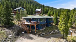 an aerial view of a house in the woods at 2BR Blue River Home withStunning Views in Blue River