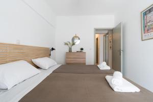 Postel nebo postele na pokoji v ubytování Platon Central Apartment