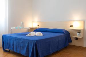 Postel nebo postele na pokoji v ubytování B&B Miracapri