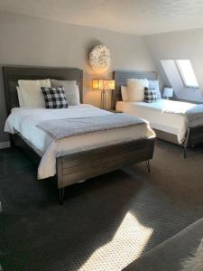 a bedroom with two beds in a room at Breathtaking Mountain Views Ski In Out 2BR Condo in Park City +41 photos