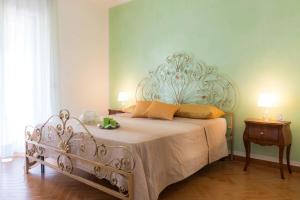 Postel nebo postele na pokoji v ubytování B&B Miracapri