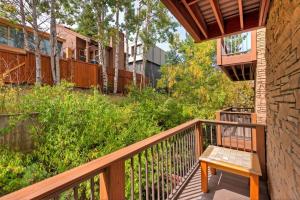 a wooden porch with a bench on a balcony at Stunning Location 2BDR Condo Retreat in Park City