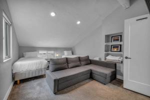 a living room with a couch and a bed at Park City Canyons Ski Cabriolet Community Amenity in Park City
