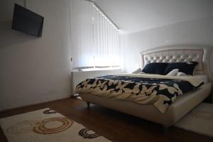 Postel nebo postele na pokoji v ubytování Tešić Seoska Idila